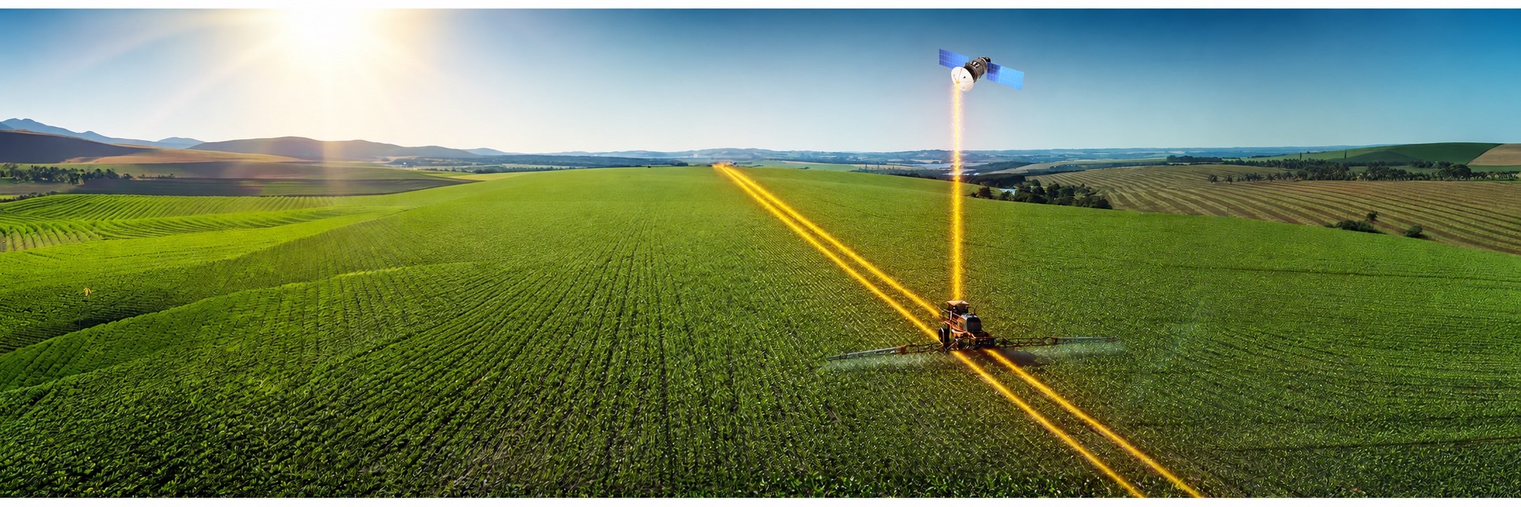 Máquina agrícola na lavoura recebendo correção de sinal via satélite